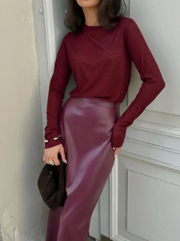 Janine | La Jupe Midi en Vinyle Luxe