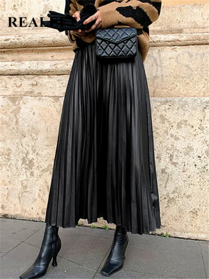 Lison | La Jupe Midi Plissée Luxe